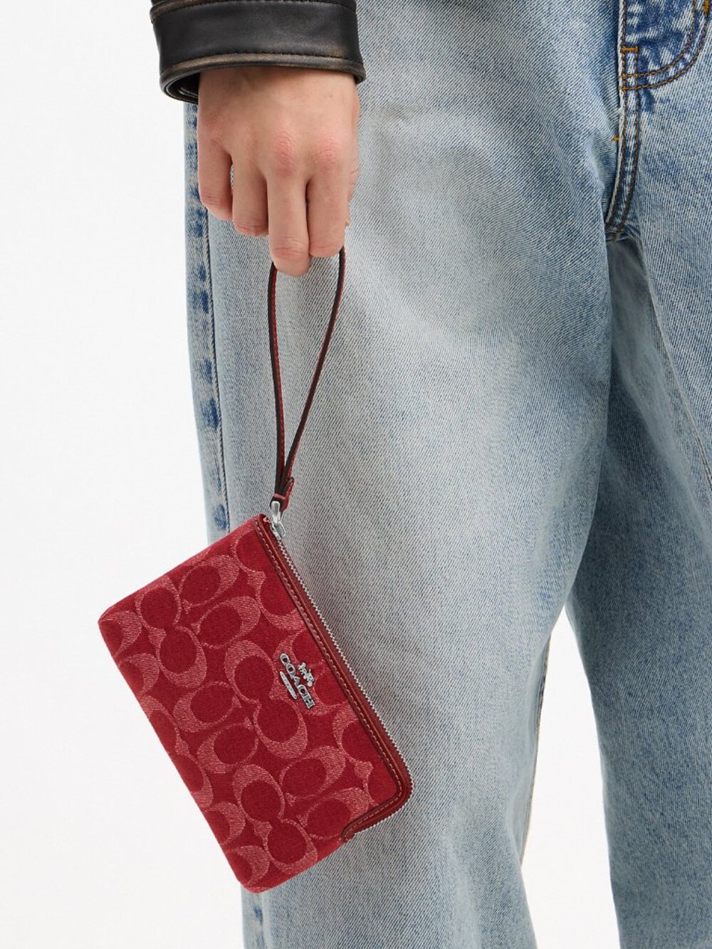 Coach Corner Zip Wristlet In Signature Denim